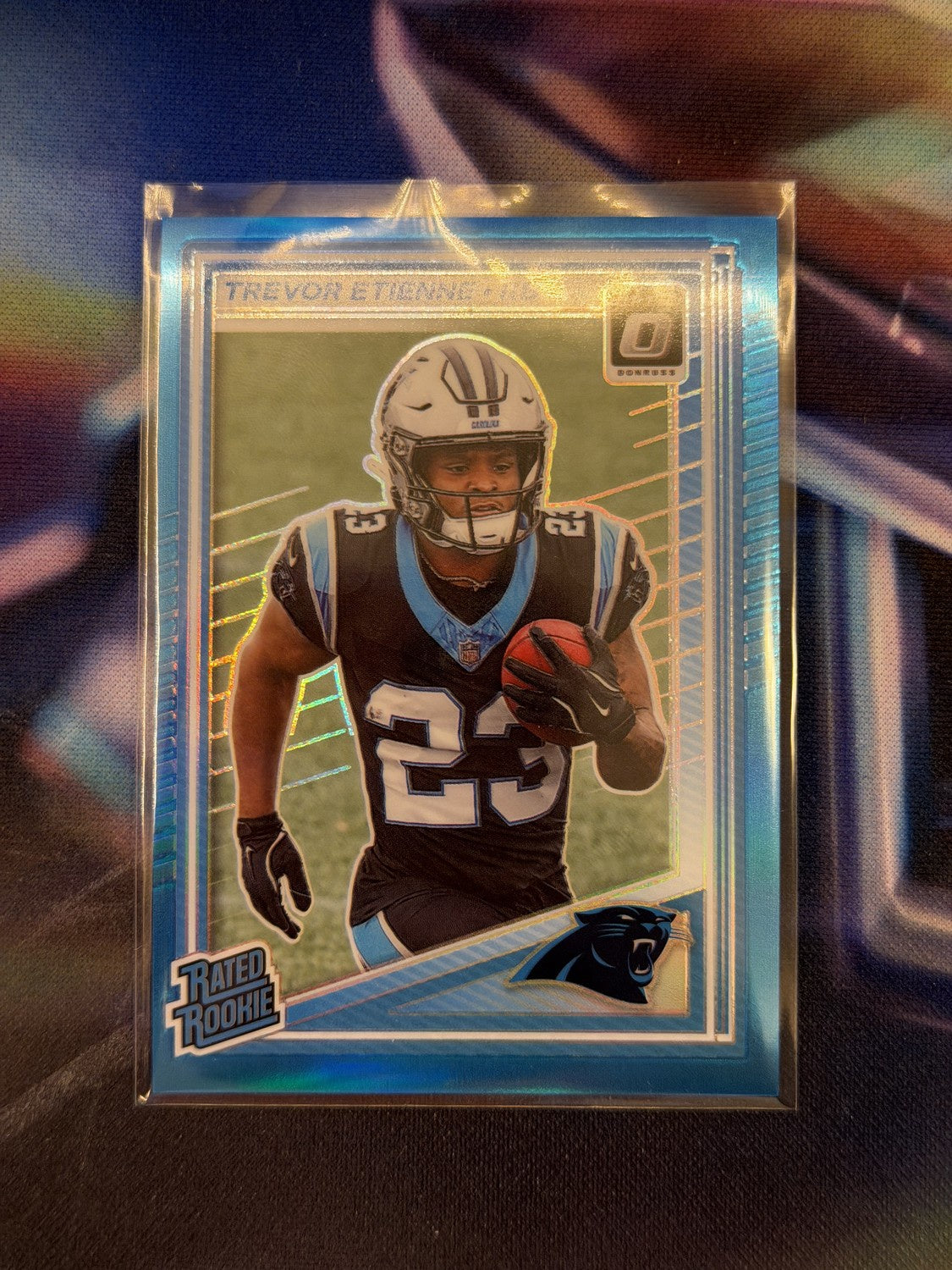 Travis Etienne Jr. Rated Rookie Blue Prizm Front - 2025 Donruss Optic